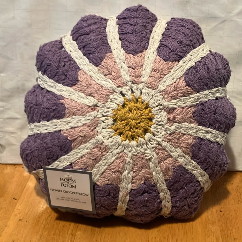 NWT.  Floral crochet pillow sz 12”-12” circle. Pretty lilac , pink , gold n